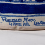 Ysauro Uriarte's monogram and text reads, "Puebla, Mex. 4 Pte. 914"