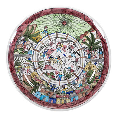 A round ceramic plate with artwork of bull fight scene in the center and spectators all around.