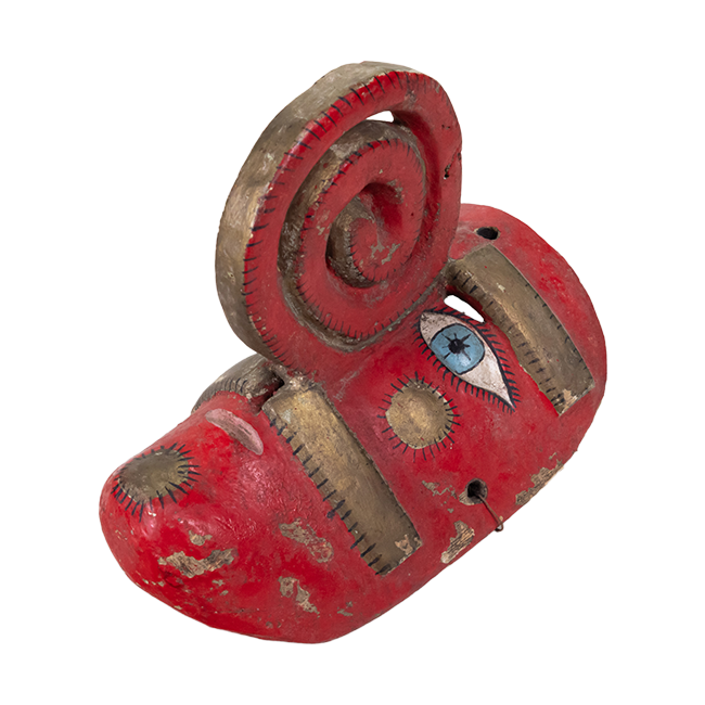 A red polychromed painted Nahua mask with a spiral nose and gold leaf painted details.