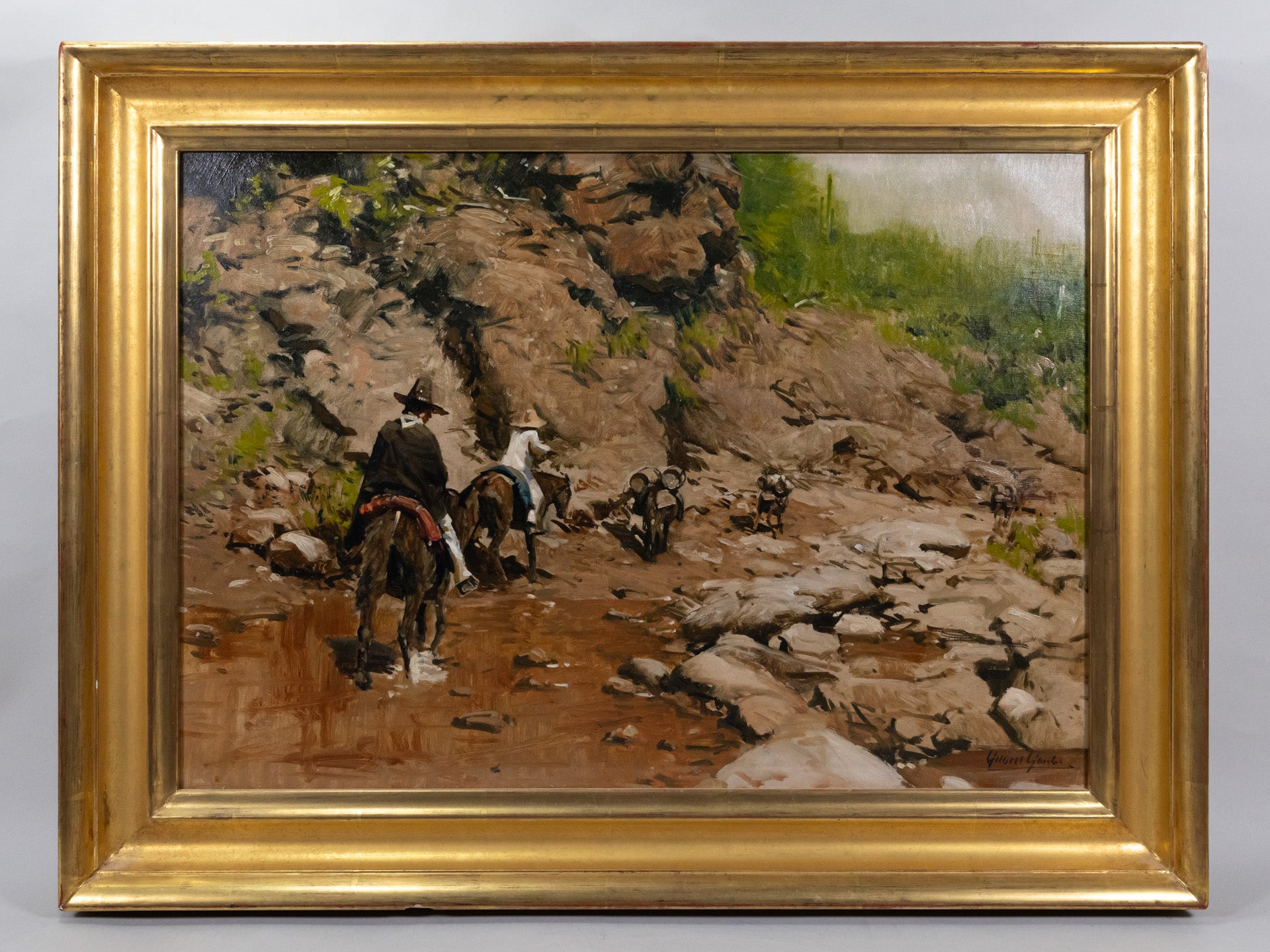 Oil painting of cowboys riding on horses through a rocky landscape.