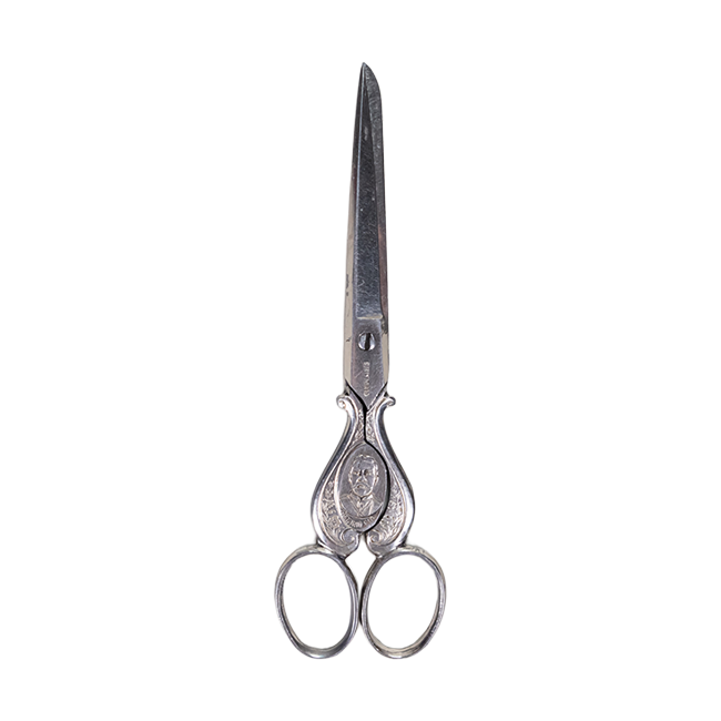 Silver sewing scissors decorated with a plant and floral design, with President Porfirio Diaz's bust.