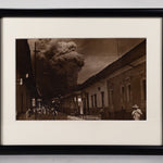 Framed sepia photograph of the eruption of Parícutin, taken in the streets of Uruapan.