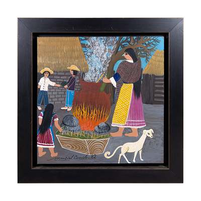 Framed oil on wood painting of an outdoor village scene, with stone buildings in the background, a woman cooking with an open fire, children in the background and a white dog in the foreground.